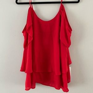 Francesca’s red blouse